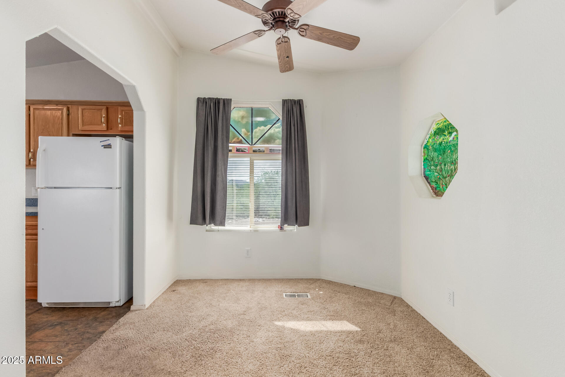 3130 West Lazy G Ranch Road New River, AZ 85087 - Photo 14 of 35 a view of an empty room with a window