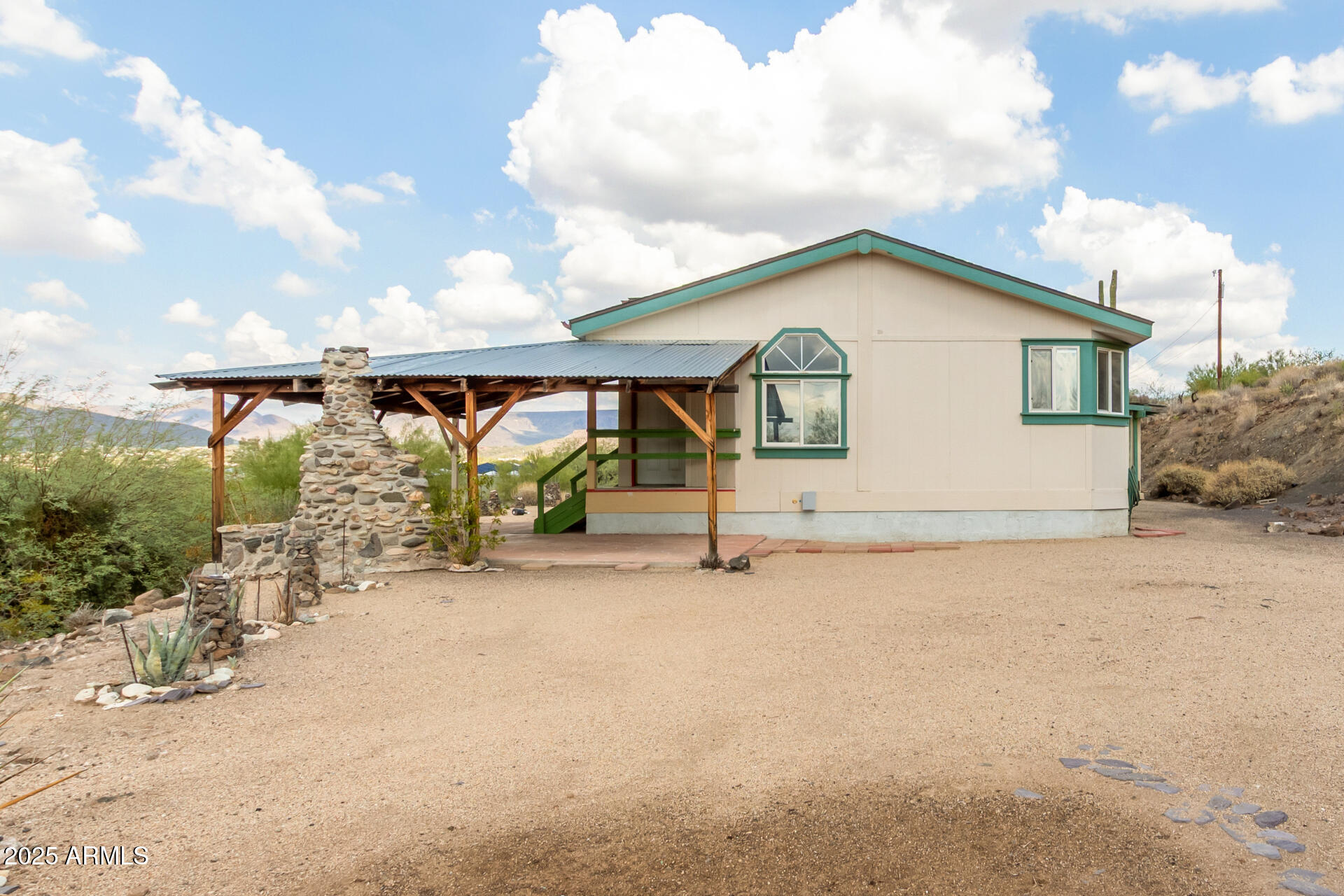 3130 West Lazy G Ranch Road New River, AZ 85087 - Photo 2 of 35 a view of a house with wooden fence