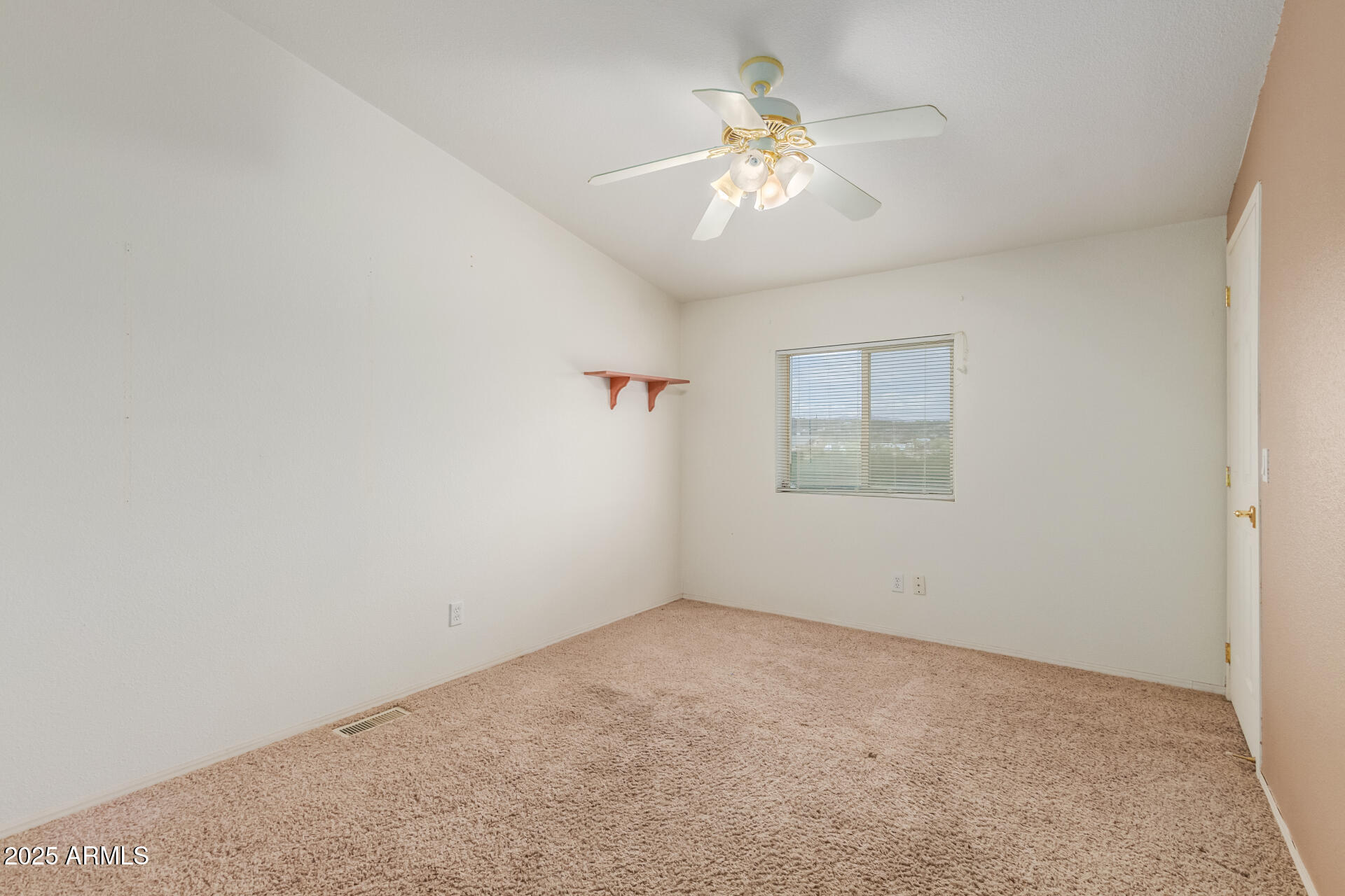 3130 West Lazy G Ranch Road New River, AZ 85087 - Photo 27 of 35 an empty room with windows