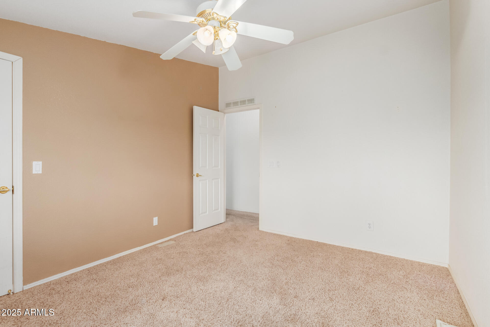 3130 West Lazy G Ranch Road New River, AZ 85087 - Photo 28 of 35 an empty room with a fan and a fan