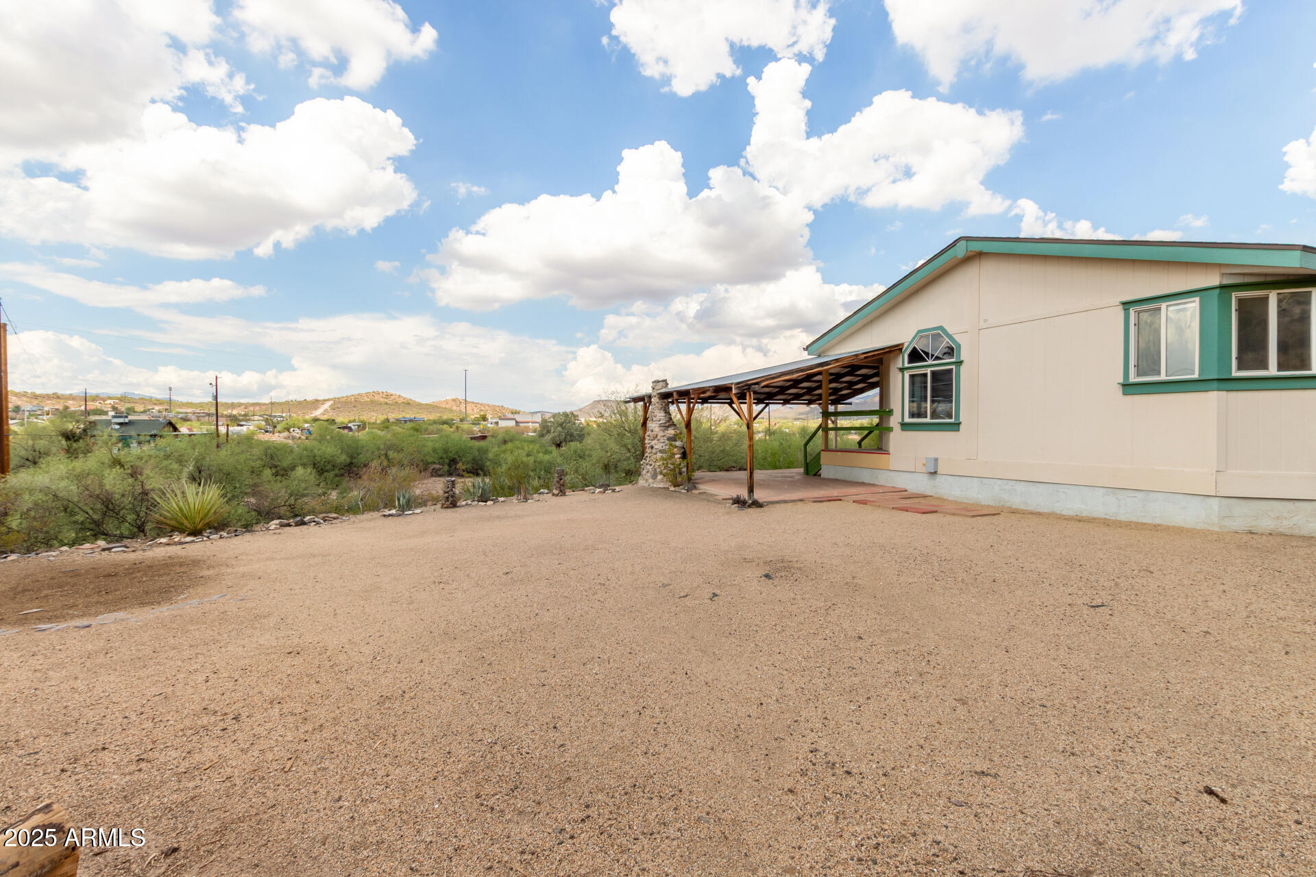 3130 West Lazy G Ranch Road New River, AZ 85087 - Photo 3 of 35 a view of a house with backyard and trees