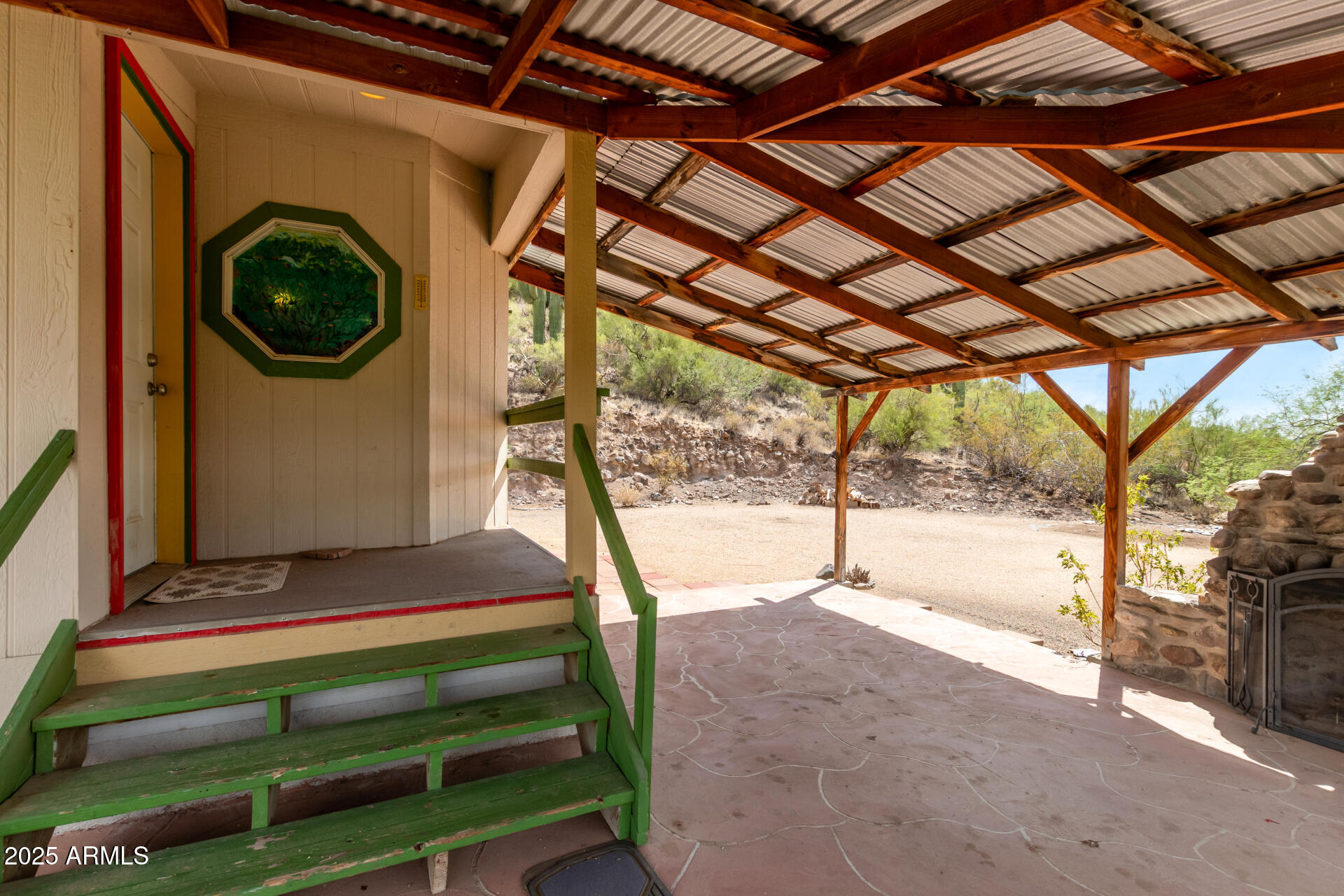3130 West Lazy G Ranch Road New River, AZ 85087 - Photo 7 of 35 a house with trees in front of it