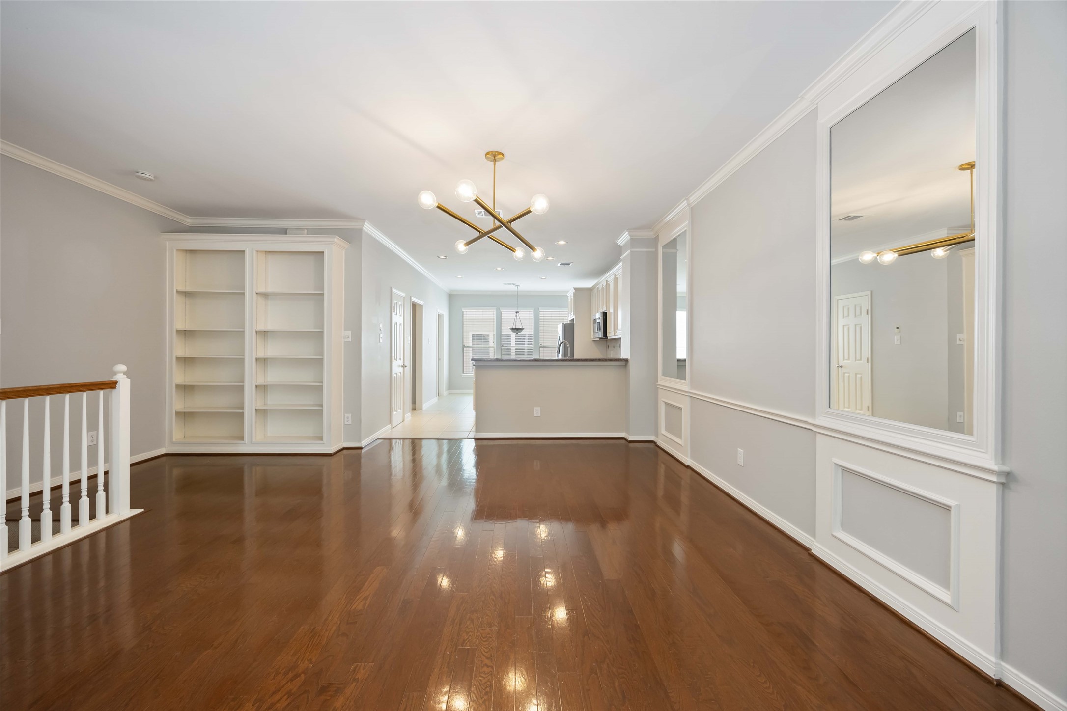 2909 West Dallas Street Houston, TX 77019 - Photo 11 of 39 wooden floor in an empty room with a window