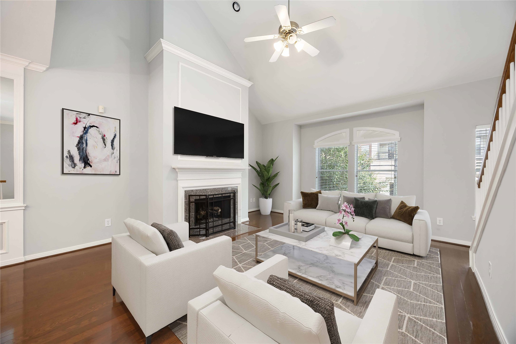 2909 West Dallas Street Houston, TX 77019 - Photo 13 of 39 a living room with furniture a fireplace and a flat screen tv