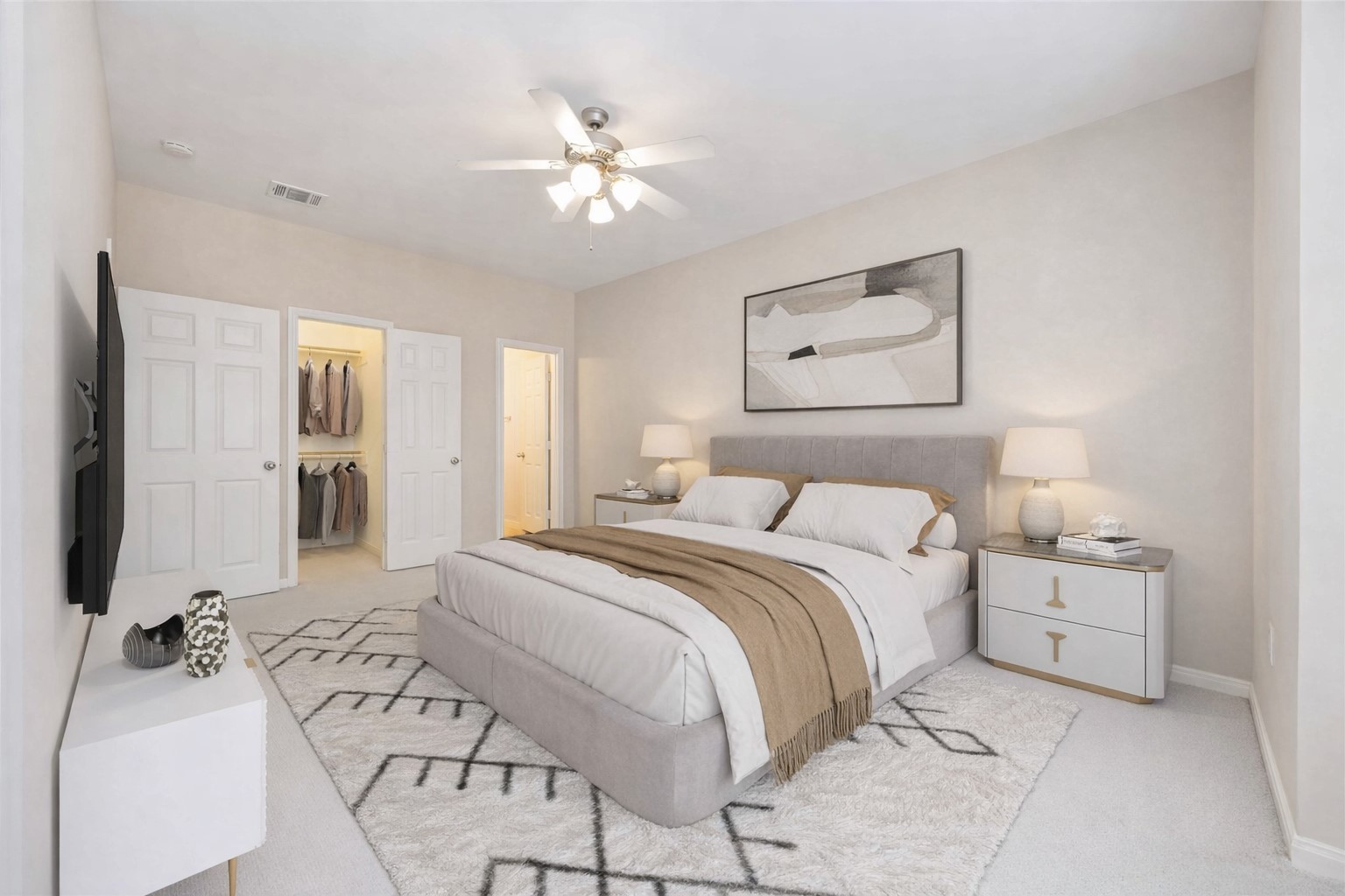 2909 West Dallas Street Houston, TX 77019 - Photo 2 of 39 a bedroom with a large bed and a chandelier