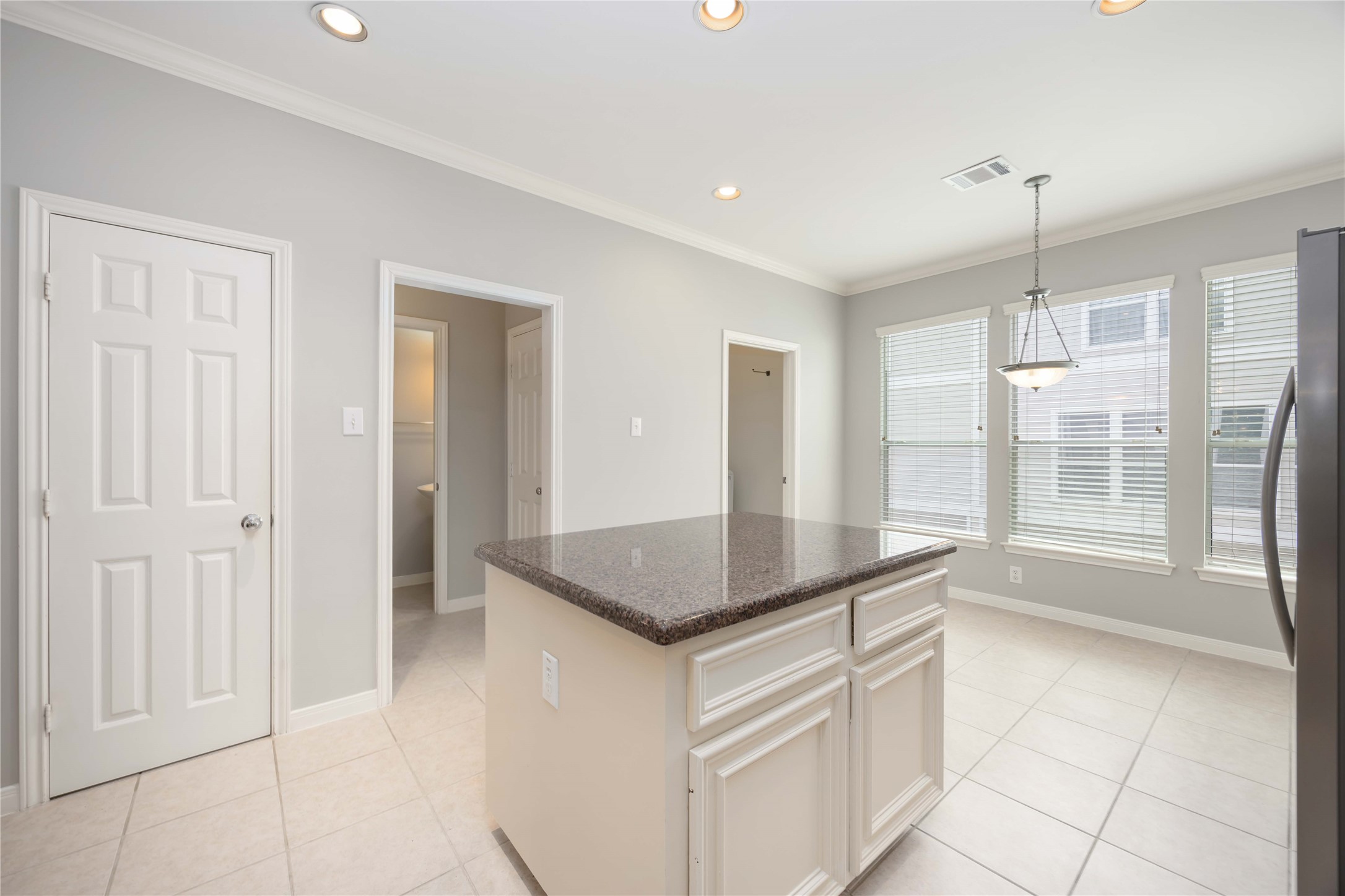 2909 West Dallas Street Houston, TX 77019 - Photo 21 of 39 a kitchen with stainless steel appliances granite countertop a sink and a granite counter tops