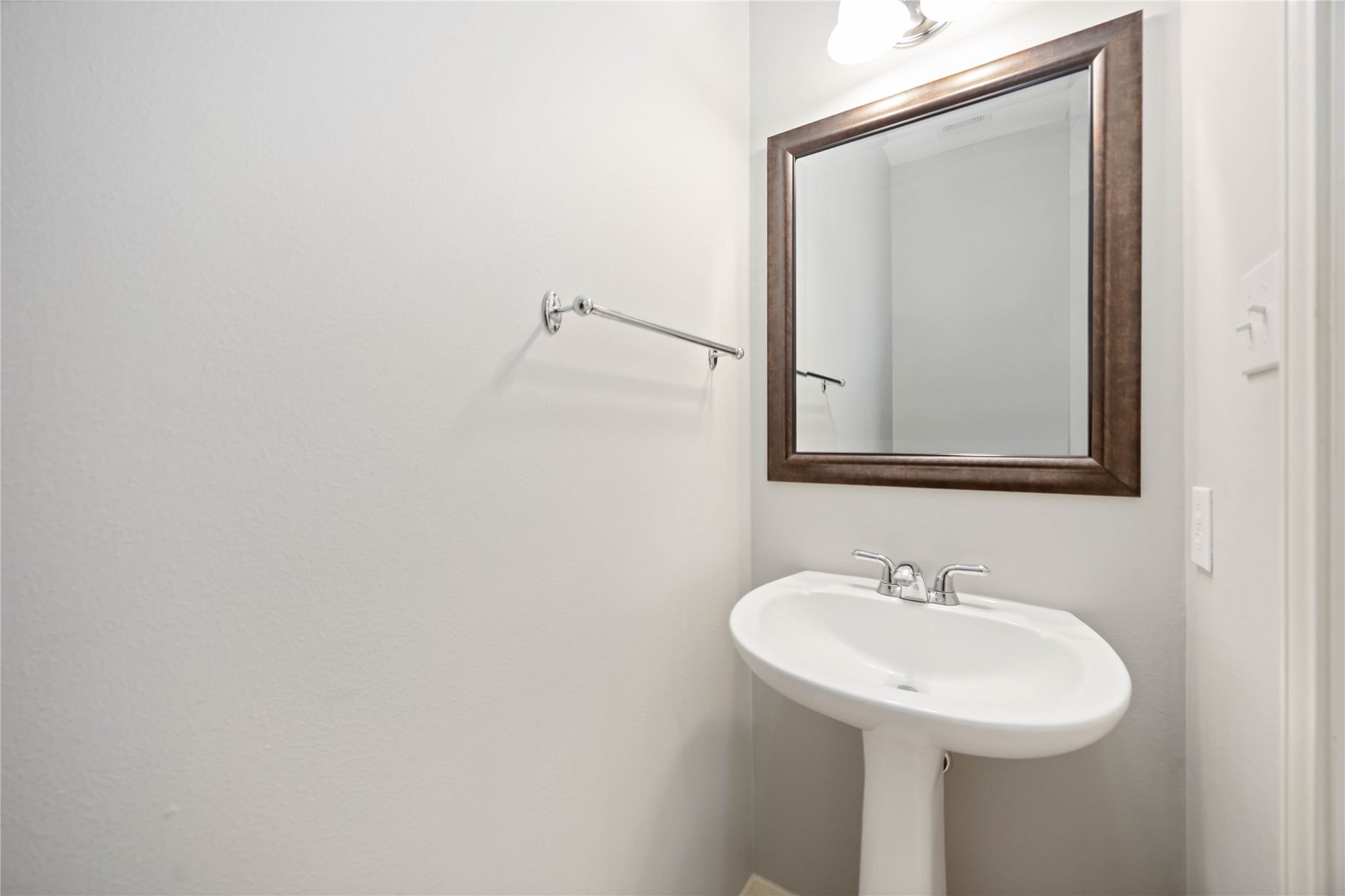 2909 West Dallas Street Houston, TX 77019 - Photo 26 of 39 a bathroom with a sink a mirror and vanity