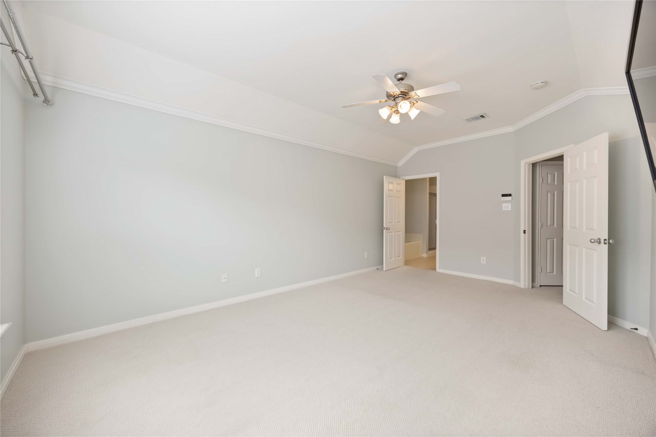 2909 West Dallas Street Houston, TX 77019 - Photo 31 of 39 a view of an empty room with a ceiling fan and window