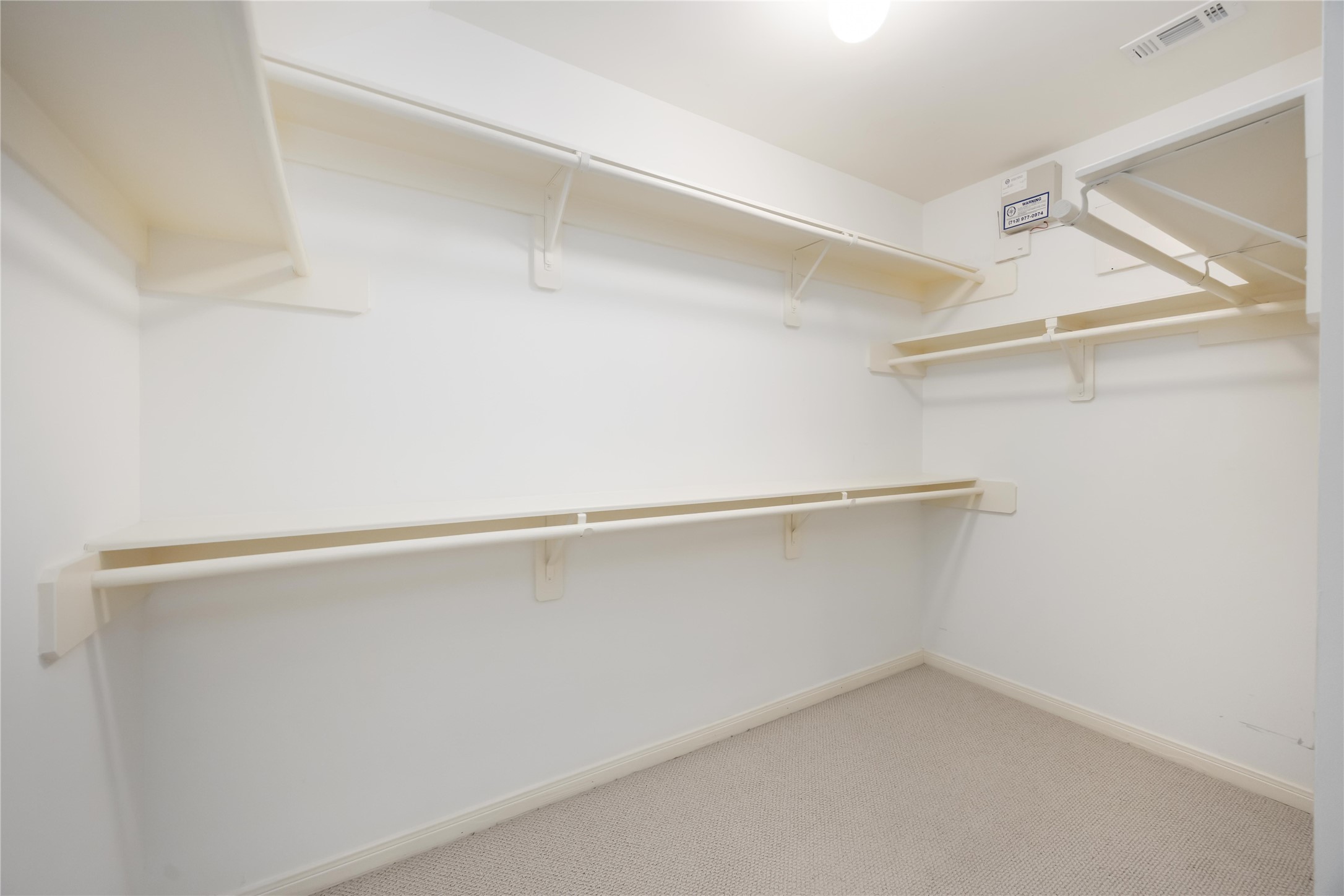 2909 West Dallas Street Houston, TX 77019 - Photo 36 of 39 a view of an empty walk in closet