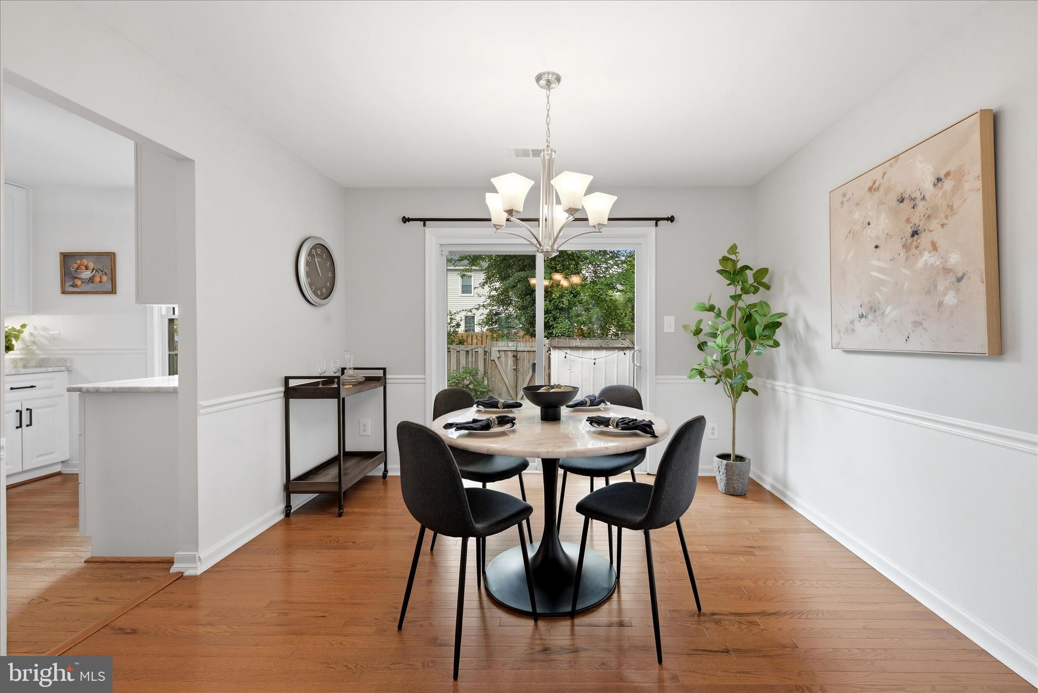 5446 Lighthouse Lane Burke, VA 22015 - Photo 4 of 36 a view of a dining room with furniture window and wooden floor