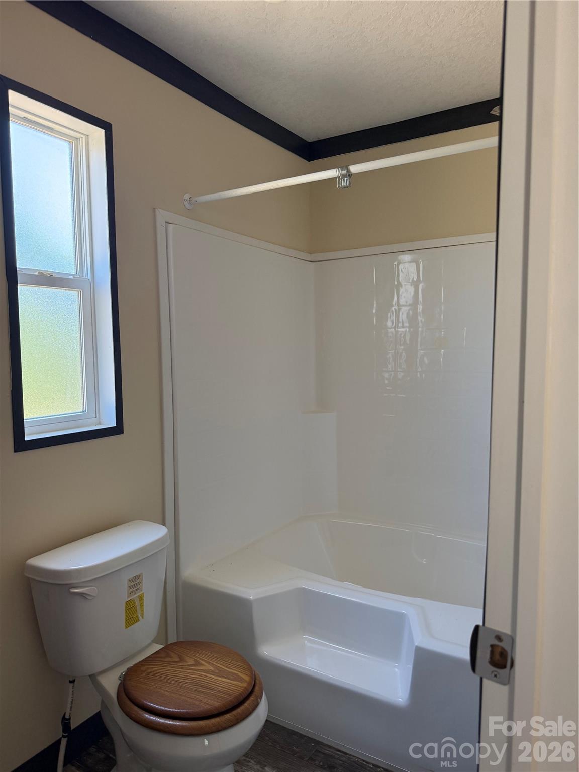 2640 Old Wire Road West Wallace, SC 29596 - Photo 12 of 18 a bathroom with a toilet and a shower