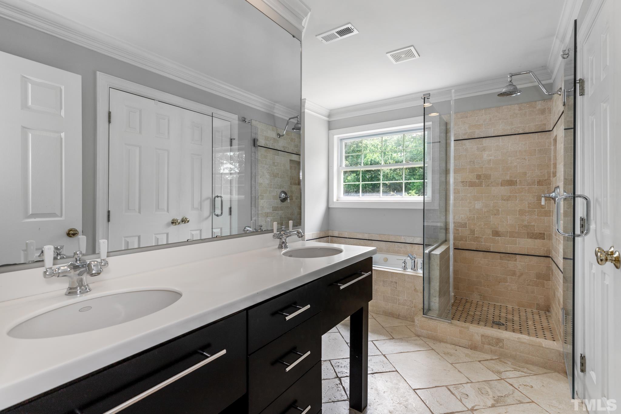 6630 Winding Trail Raleigh, NC 27612 - Photo 21 of 33 a bathroom with a sink and a mirror