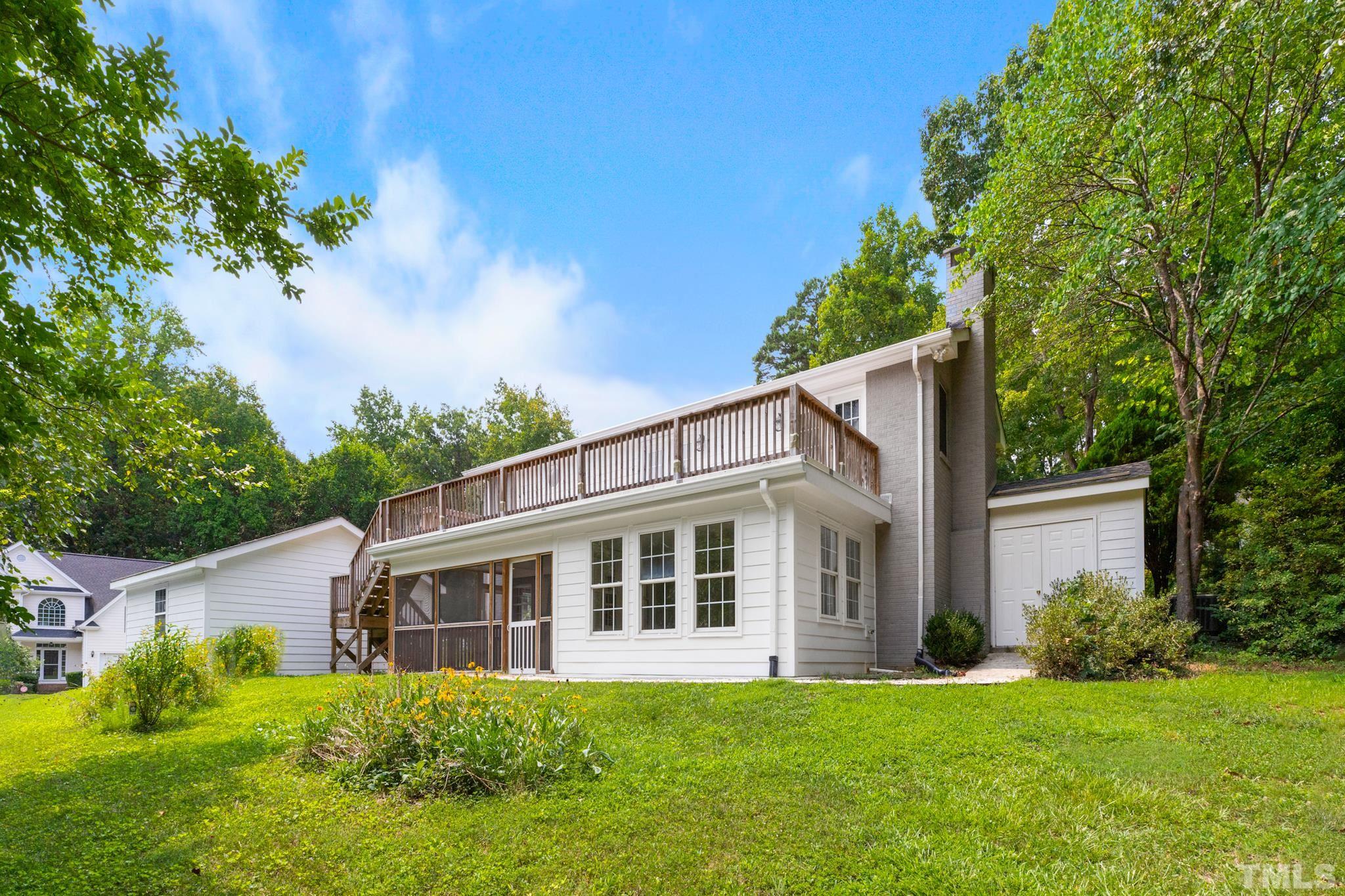 6630 Winding Trail Raleigh, NC 27612 - Photo 30 of 33 a view of a house with a yard