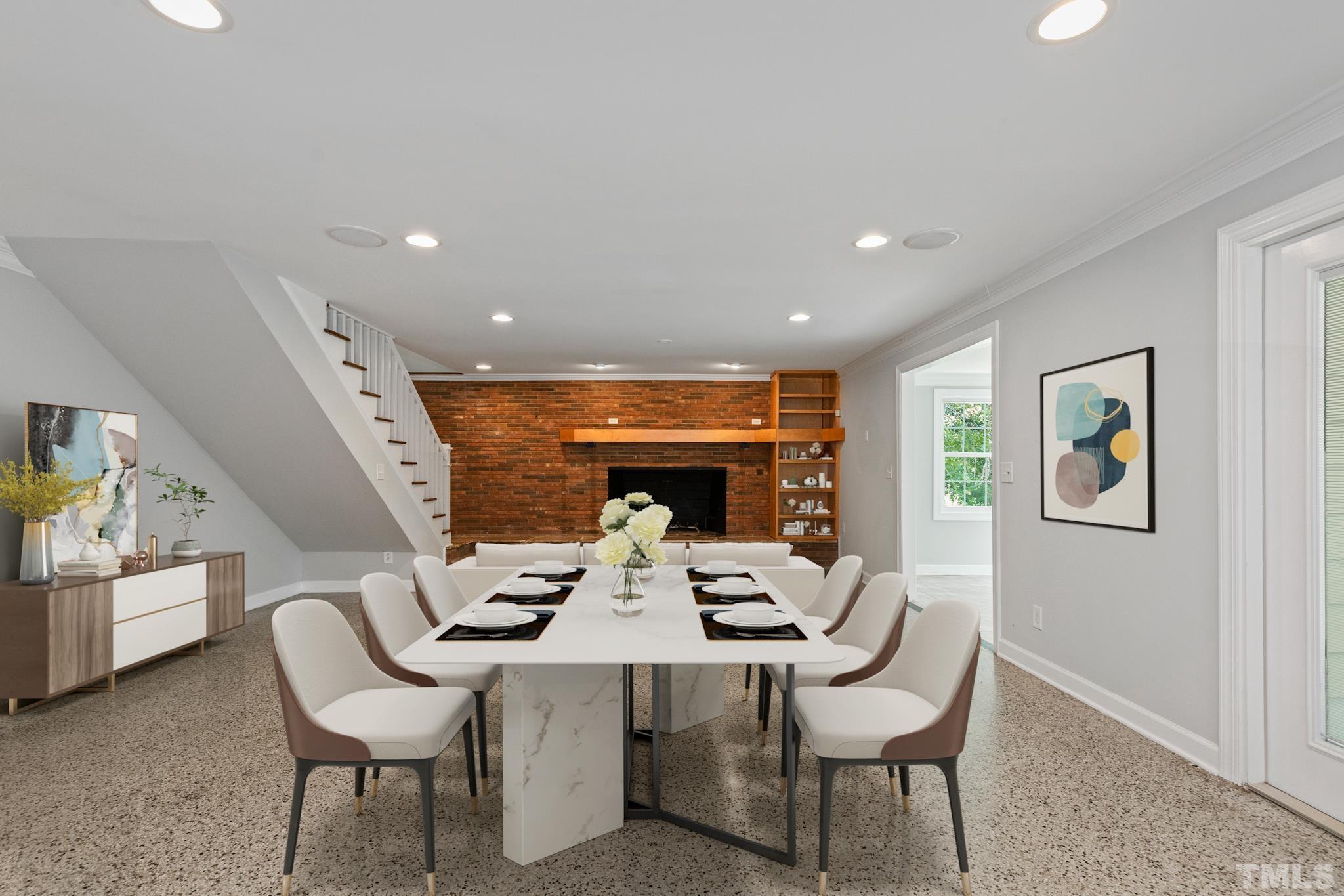 6630 Winding Trail Raleigh, NC 27612 - Photo 6 of 33 a view of a dining room with furniture a rug and wooden floor