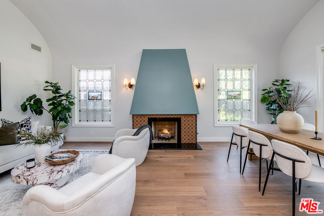 4359 Clybourn Avenue Toluca Lake, CA 91602 - Photo 11 of 45 a living room with furniture and a fireplace