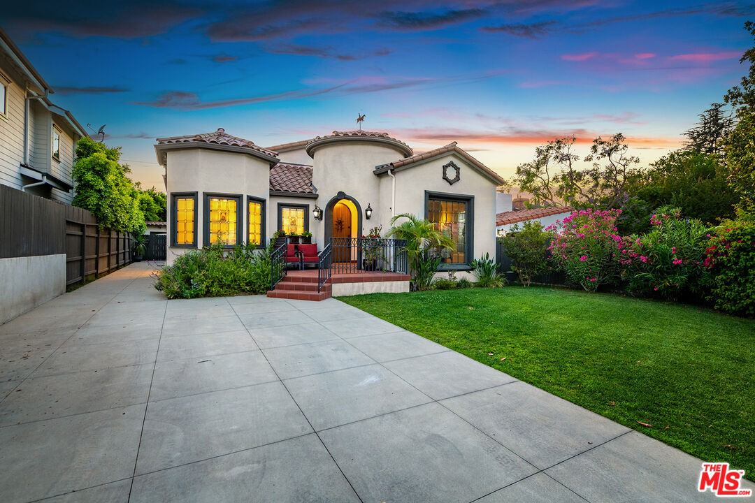 4359 Clybourn Avenue Toluca Lake, CA 91602 - Photo 4 of 45 a front view of house with yard and green space
