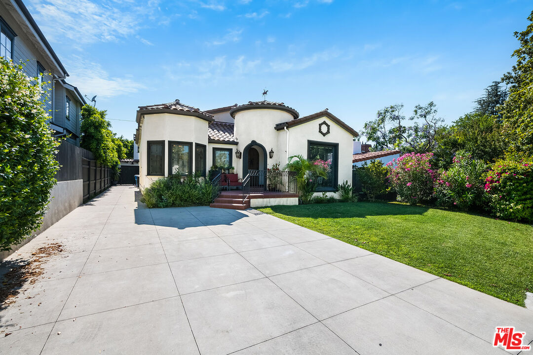 4359 Clybourn Avenue Toluca Lake, CA 91602 - Photo 42 of 45 a house view with a garden space