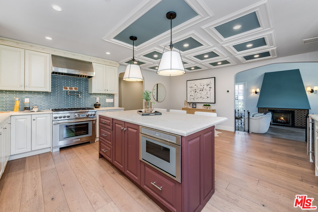 4359 Clybourn Avenue Toluca Lake, CA 91602 - Photo 10 of 45 a kitchen with a stove and a refrigerator