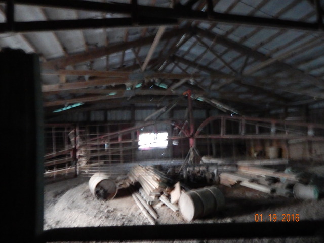 2827 East 2575th Road Marseilles, IL 61341 - Photo 14 of 15 a room with water heater and racks