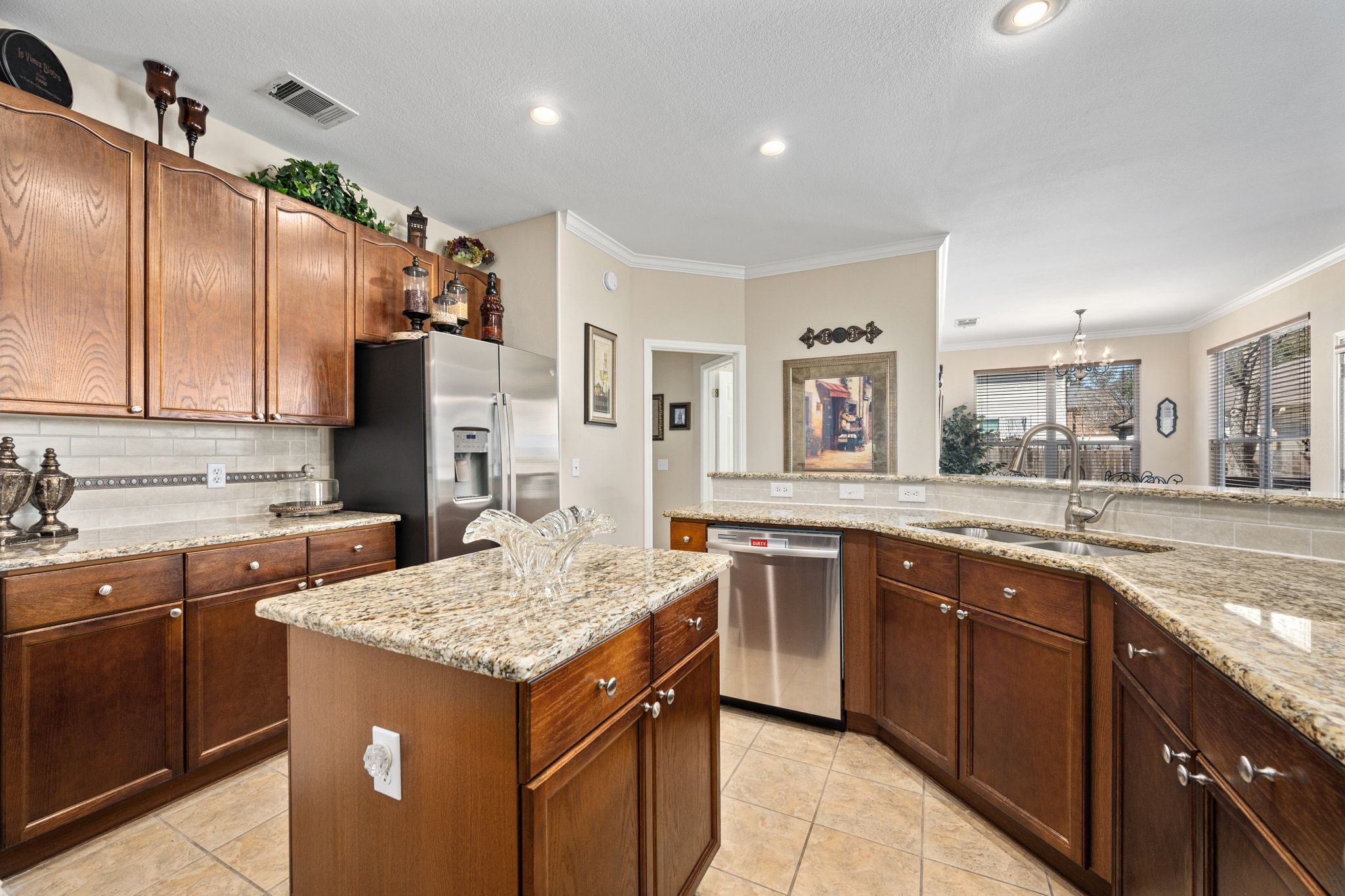 3312 Marin Court Austin, TX 78738 - Photo 17 of 40 Featuring lots of counter space and cabinetry storage galore plus a spacious pantry.