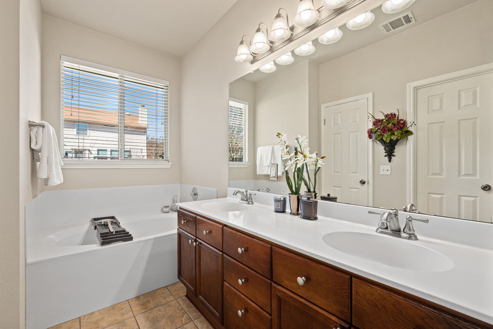 3312 Marin Court Austin, TX 78738 - Photo 20 of 40 Enjoy your own private ensuite bath complete with a dual vanity, garden tub, and separate shower.