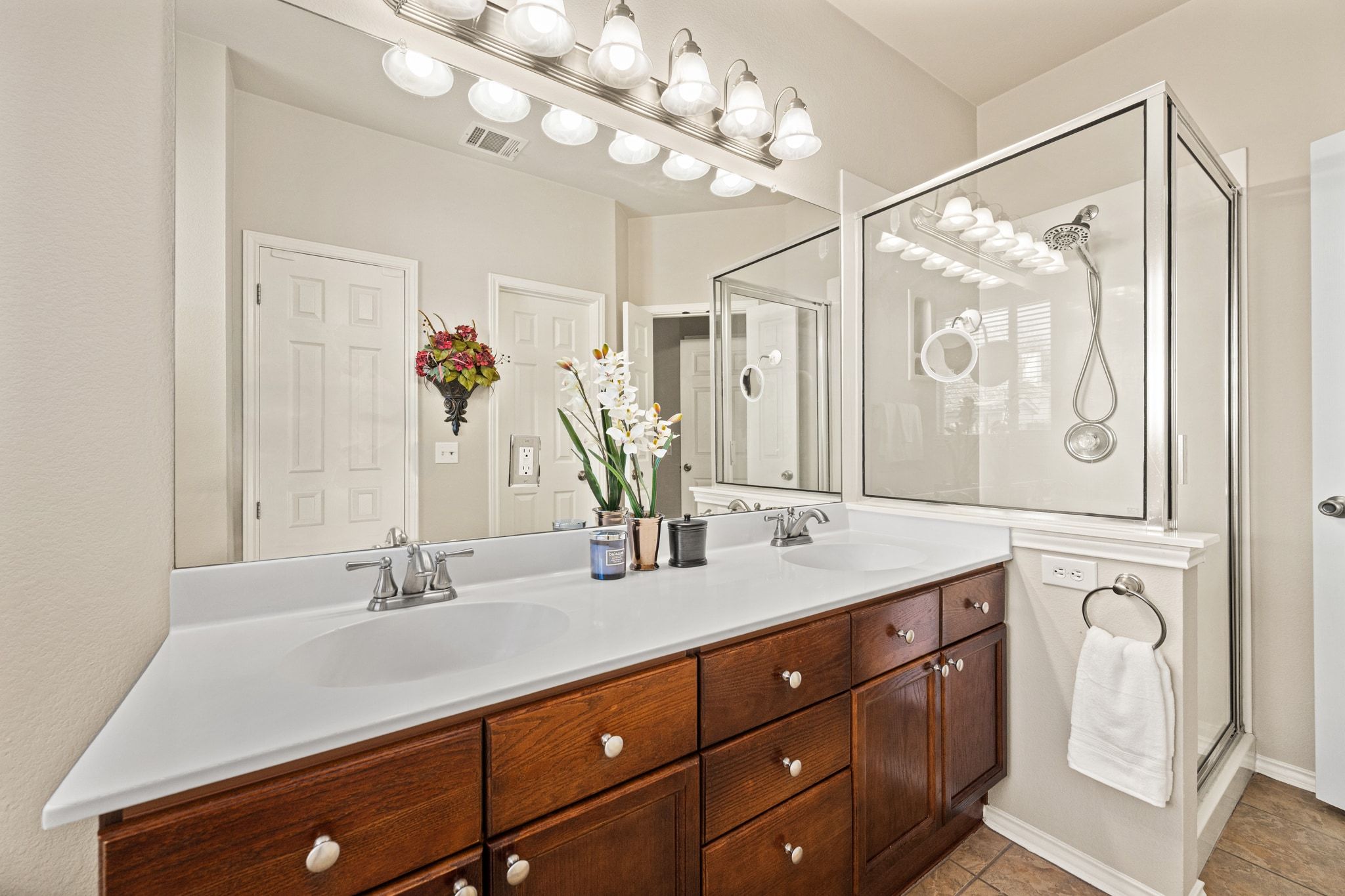 3312 Marin Court Austin, TX 78738 - Photo 21 of 40 The primary ensuite also comes with dual walk-in closets and a private toilet.