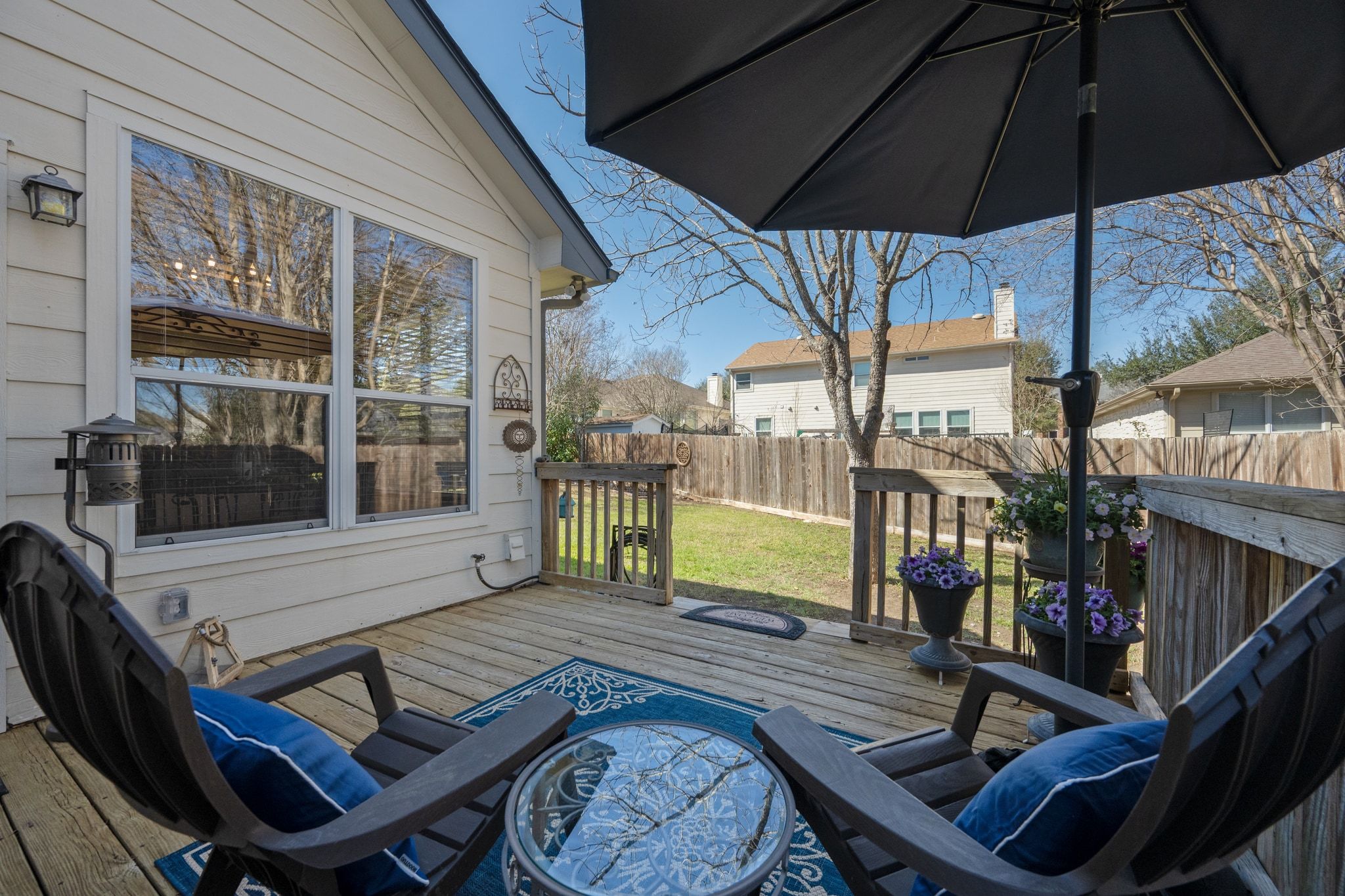 3312 Marin Court Austin, TX 78738 - Photo 5 of 40 Outdoor living shines with a lovely back deck and perfectly sized fenced-in yard.