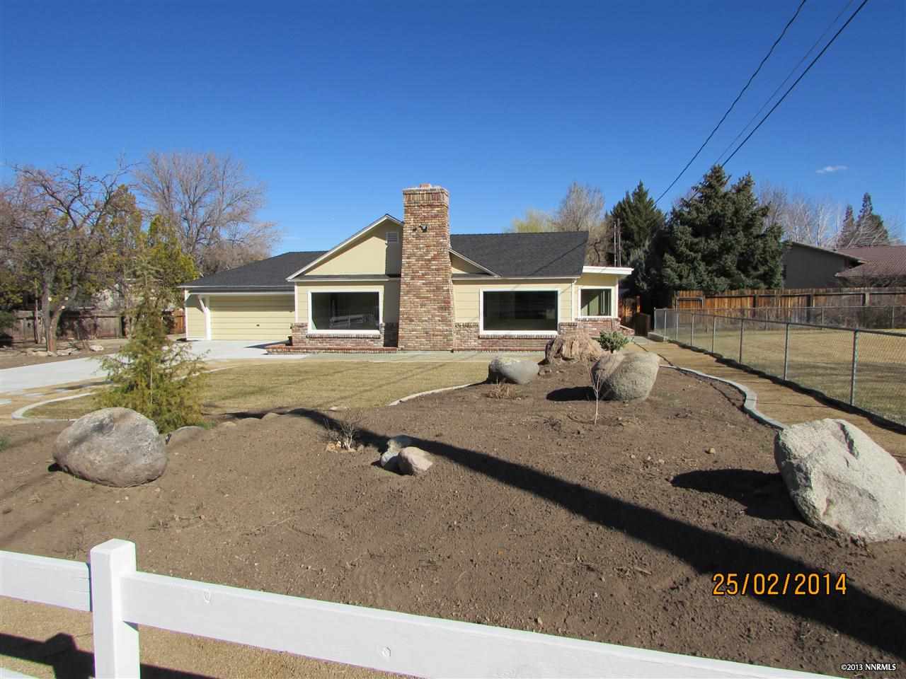 1450 Davidson Way Reno, NV 89509 - Photo 1 of 1 a view of a house with backyard and sitting area