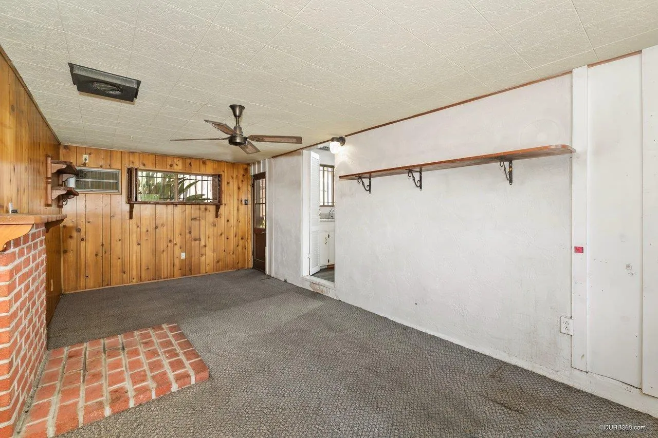 4112 Lewis Street Oceanside, CA 92056 - Photo 16 of 36 a view of a big room with wooden floor and windows