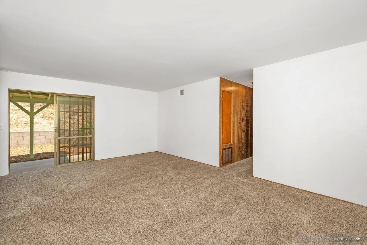 4112 Lewis Street Oceanside, CA 92056 - Photo 9 of 36 a view of an empty room with a window