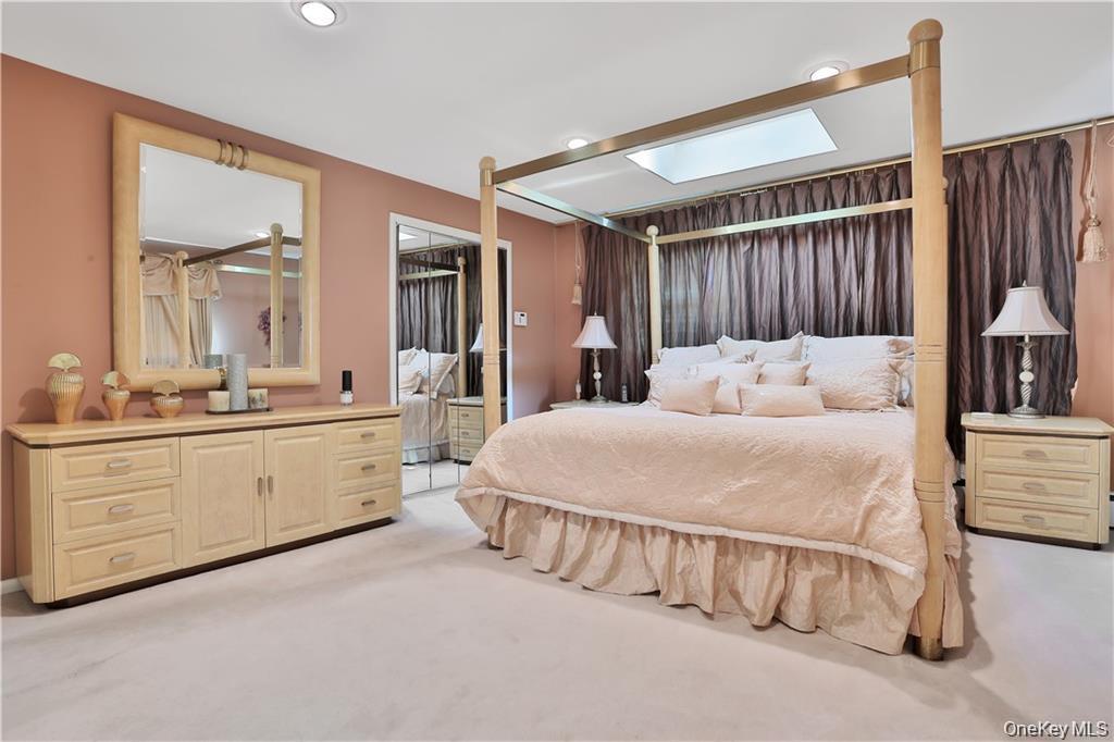 2 Split Tree Drive New Windsor, NY 12553 - Photo 23 of 36 Bedroom featuring a skylight, light carpet, and recessed lighting