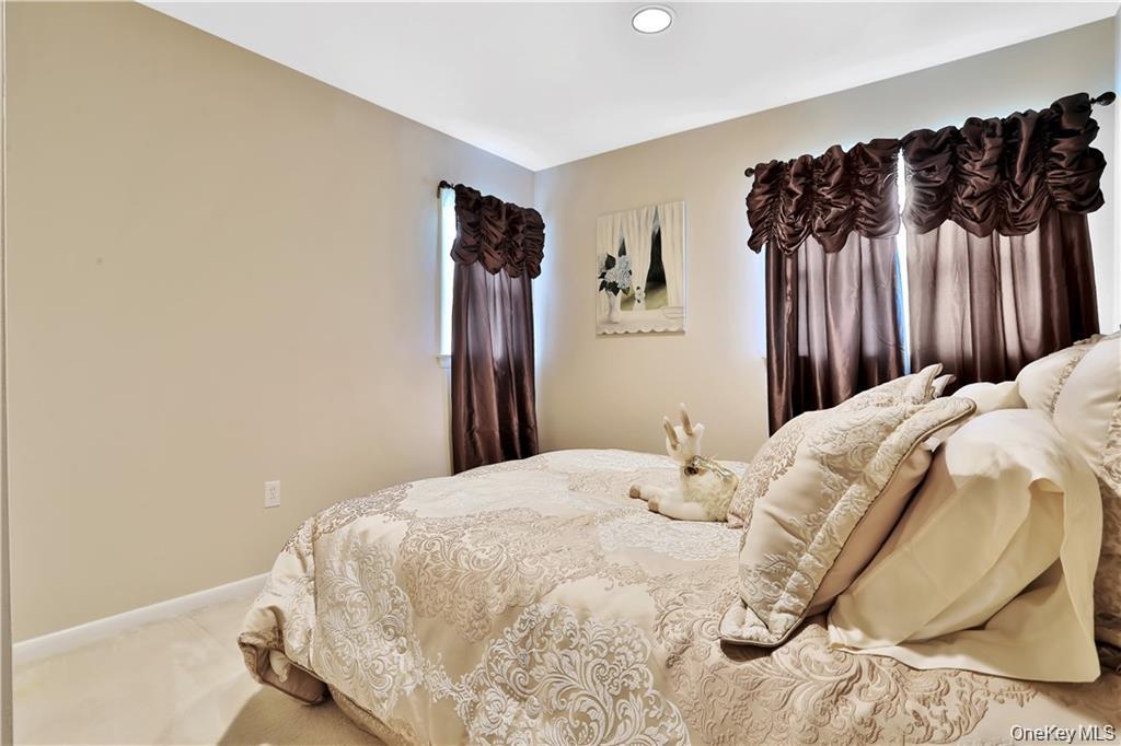 2 Split Tree Drive New Windsor, NY 12553 - Photo 28 of 36 Bedroom with carpet flooring and recessed lighting