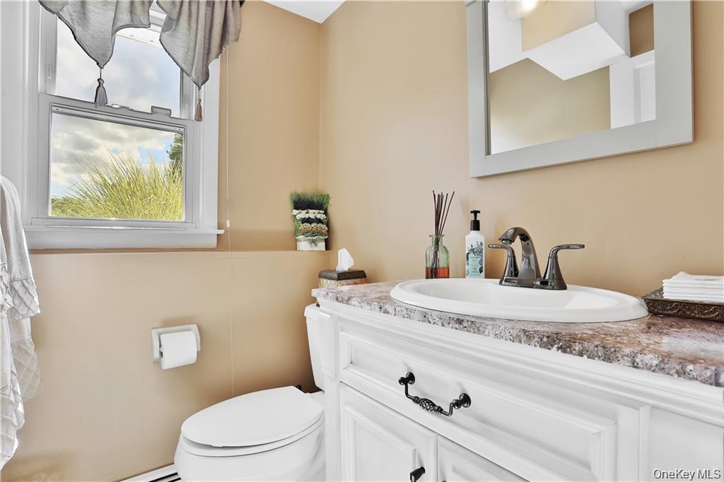 2 Split Tree Drive New Windsor, NY 12553 - Photo 32 of 36 Half bath with vanity and toilet