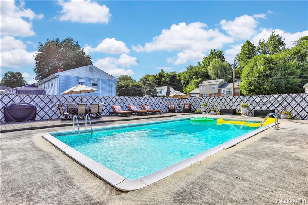 2 Split Tree Drive New Windsor, NY 12553 - Photo 33 of 36 View of swimming pool with a fenced backyard and grilling area