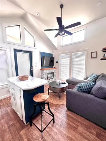 a bedroom with a bed and a mirror