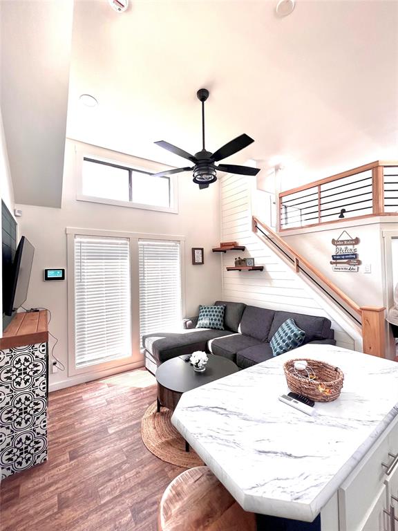 3235 County Road Cookville, TX 75558 - Photo 13 of 37 a living room with furniture and a wooden floor