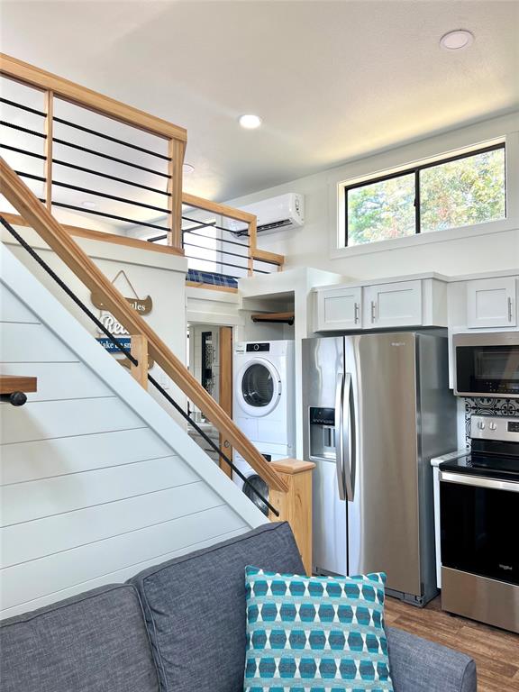 3235 County Road Cookville, TX 75558 - Photo 20 of 37 a kitchen with stainless steel appliances a refrigerator and a window
