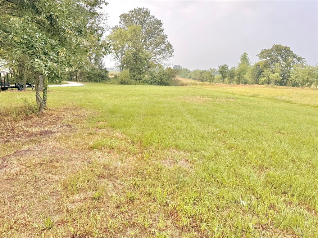 3235 County Road Cookville, TX 75558 - Photo 35 of 37 a view of an ocean and a mountain view