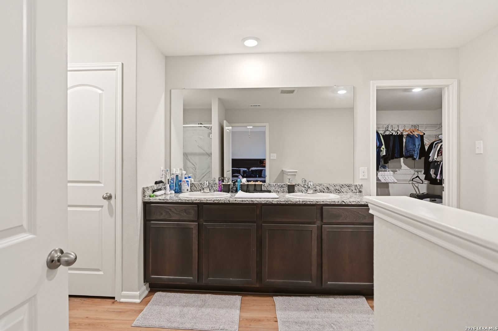 9123 Bennett Forest Converse, TX 78109 - Photo 13 of 19 a bathroom with a sink and a mirror