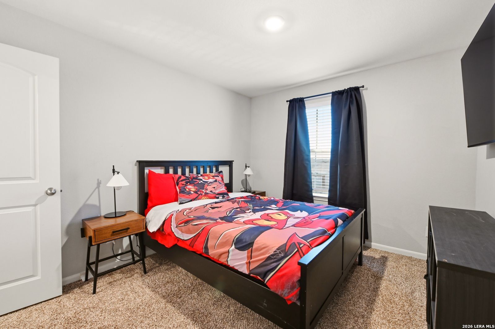 9123 Bennett Forest Converse, TX 78109 - Photo 14 of 19 a bedroom with a bed and a window