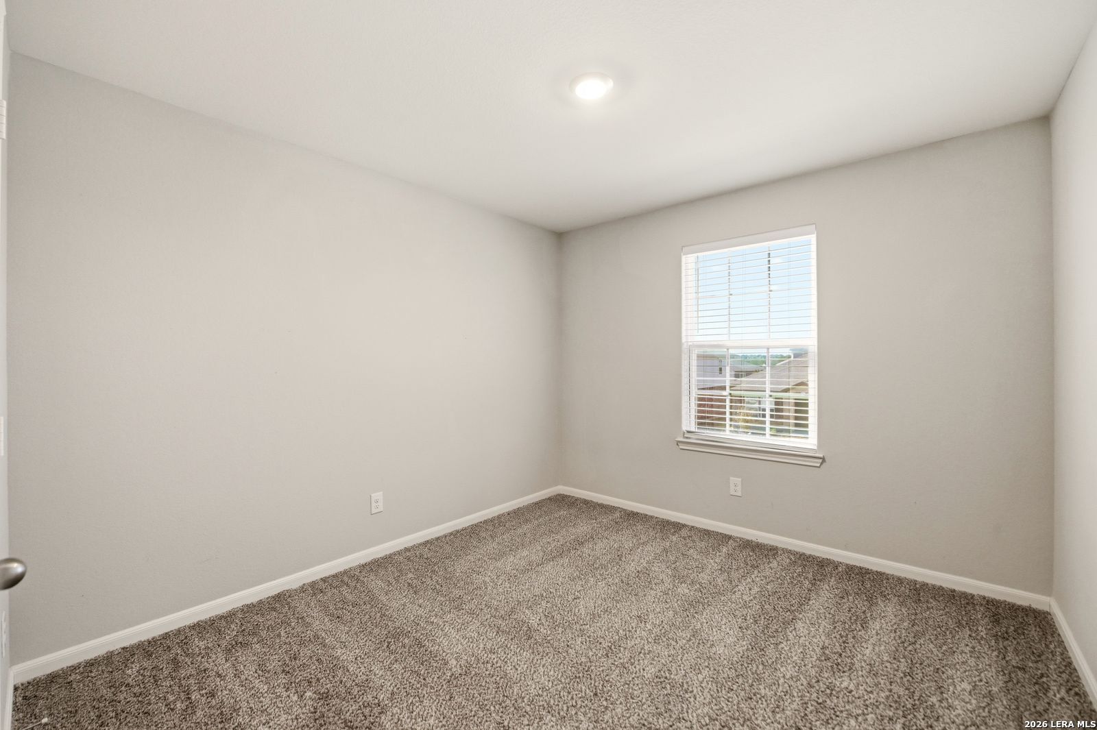 9123 Bennett Forest Converse, TX 78109 - Photo 16 of 19 an empty room with a window