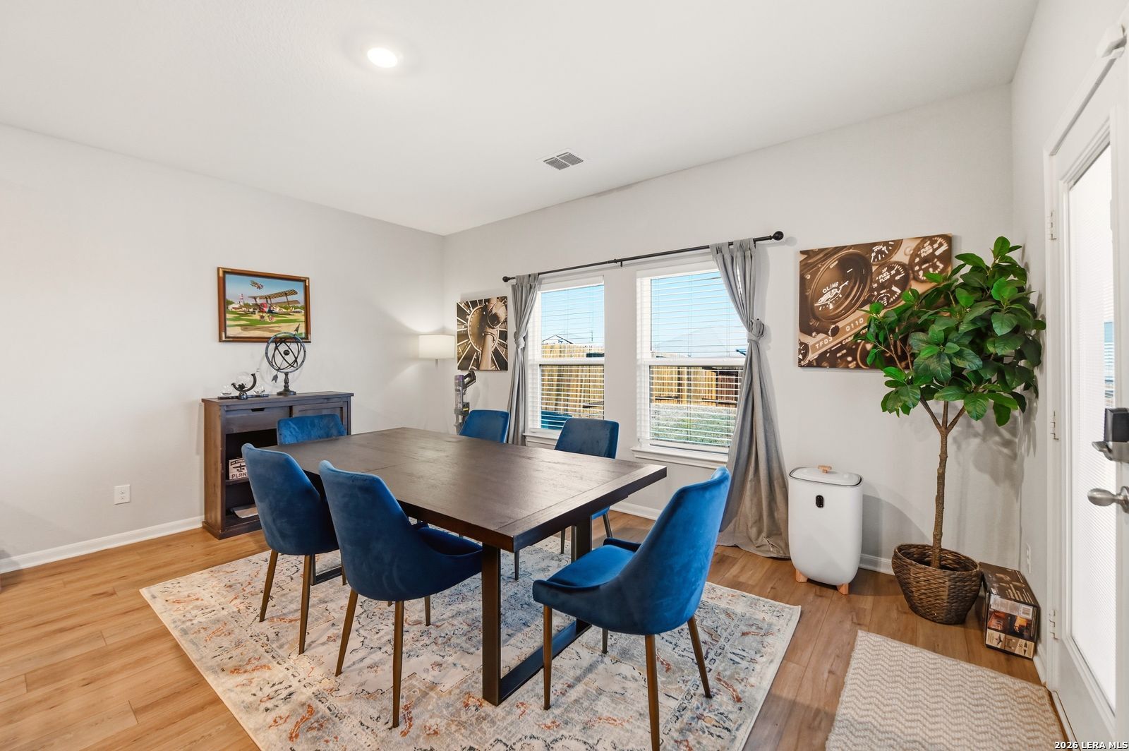 9123 Bennett Forest Converse, TX 78109 - Photo 5 of 19 a view of a dining room with furniture and wooden floor