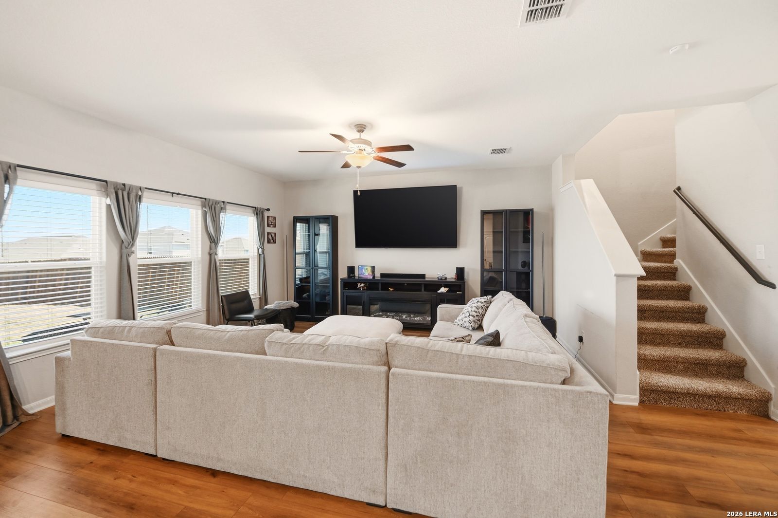 9123 Bennett Forest Converse, TX 78109 - Photo 8 of 19 a living room with furniture and a flat screen tv