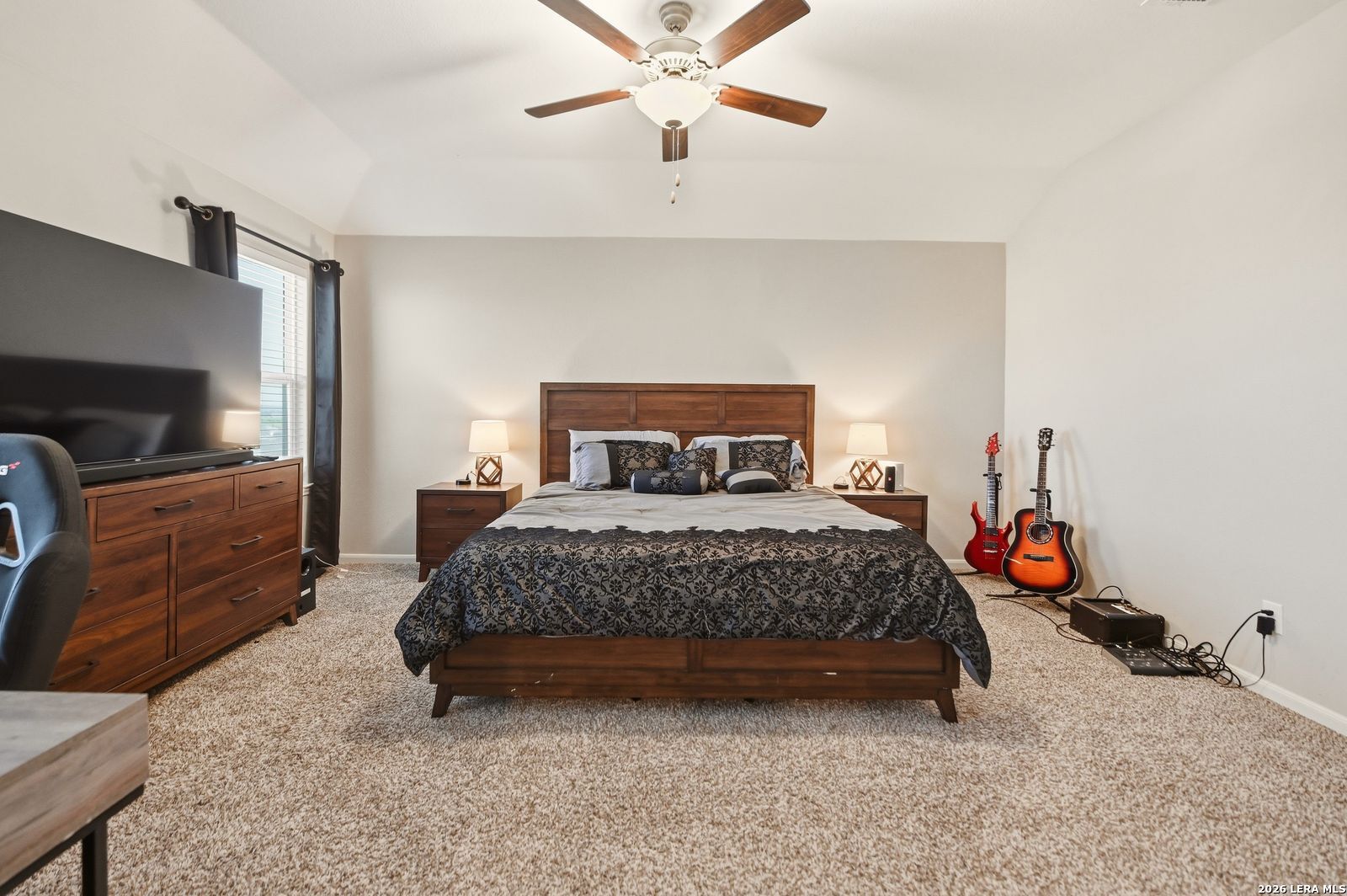 9123 Bennett Forest Converse, TX 78109 - Photo 10 of 19 a bedroom with a bed and wooden floor