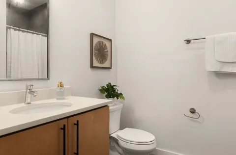 a view of a hallway with washer and dryer
