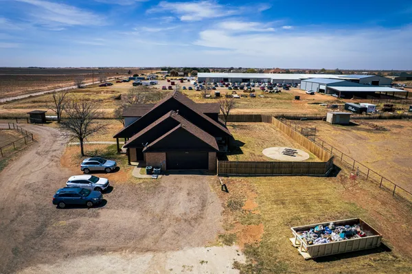 a bedroom with a bed couch and window