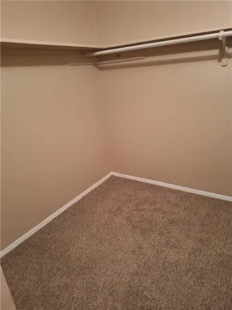a bathroom with a sink vanity and mirror
