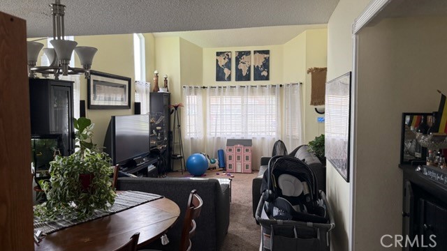 2478 KOA Drive Rialto, CA 92377 - Photo 17 of 18 a view of a workspace with furniture and entryway