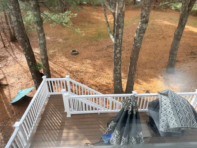 a view of balcony with furniture