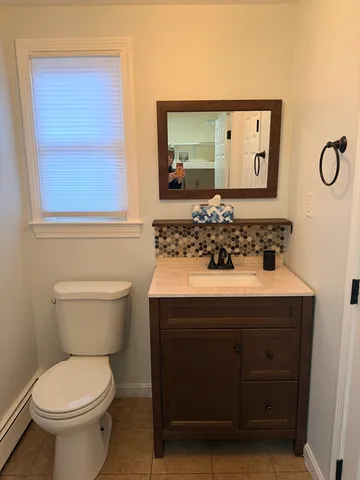 a bathroom with a sink and a toilet